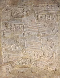 Reliëf dat het lossen van hout na transport over zee uitbeeldt, uit het paleis van Sargon II, Khorsabad, Irak